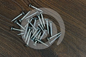 Screws on a wooden panel
