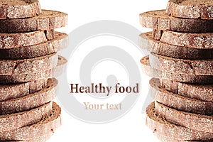 Pile of slices of black rye bread with a crispy crust on a white background. Decorative ending, border. Isolated. Concept art.