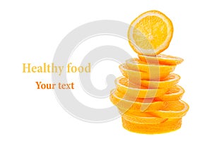 Pile of slices of sliced oranges on a white background. Isolated. Copy space. Fruit background.