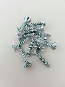 Pile of small screws closeup