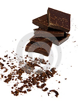 A pile of solid and grated chocolate