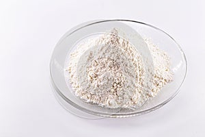 Pile of Solid Potassium Chlorate on white background photo
