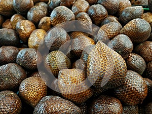 Pile of a Southeast Asian exotic fruit called Salak Indonesian Spelling or Salacca zalacca