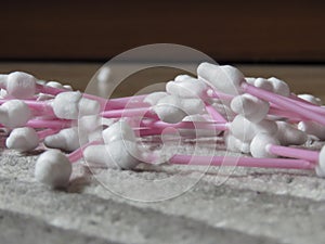 A pile of spilled Safety baby cotton buds. Ear sticks with cotton buds for cleaning ears.