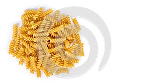 pile of spiral pasta isolated on white background. copy space, template