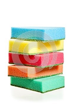 A pile of sponges for washing dishes of different colors