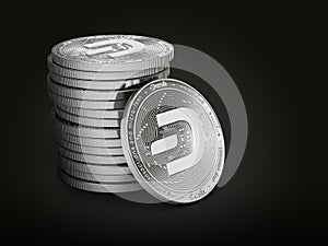 Pile or stack of silver Dash coins with 2019 logo update, isolated on black background. One coin is turned towards the viewer. New