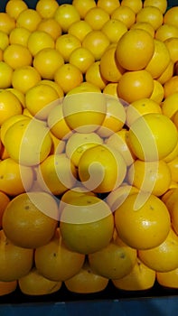 Pile of stacked yellow lemons