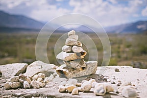 Pile stacked of zen stones or rocks with beautiful mountain