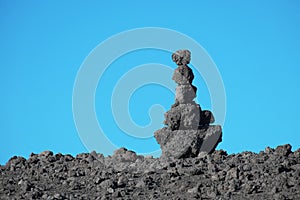 Pile Stone Balance Of Lava Rocks Against Clear Sky