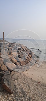 pile of stones on the beach, from indonesia