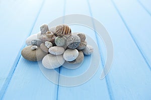 Pile of stones and a large sea shell