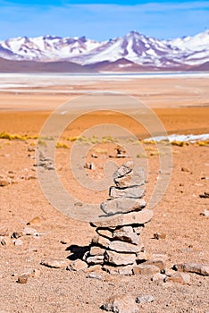 A pile of stones marks the route to the Salar de Challviri, in the Reserva Eduardo Avaroa, Sud Lipez province, Bolivia photo