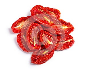 Pile of sundried tomato halves, paths, top view photo