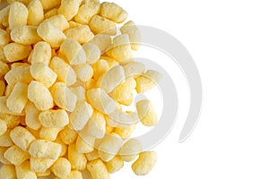 Pile of sweet corn sticks isolated on white