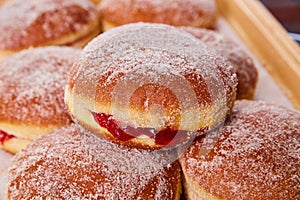 Pile of sweet Mexican baked goods pastry donuts lightly coated in sugar in pile of sweets