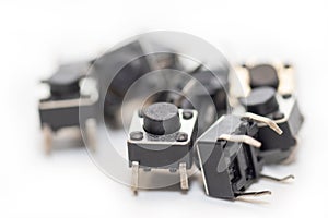 Pile of tact switch isolated on white background