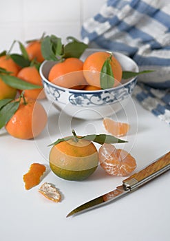 pile of tangerines on the kitchen table - closeup