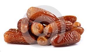 Pile of tasty dry dates isolated on white background