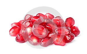 Pile of tasty pomegranate seeds on white background