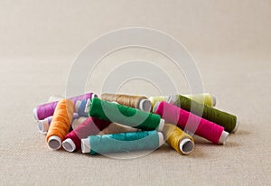 Pile of thread spools or bobbins