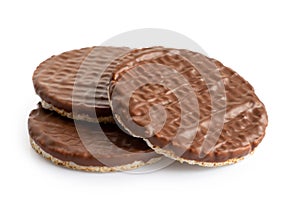 Pile of three chocolate rice cakes isolated on white.
