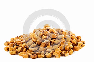 A pile of toasted salted corn on a white background