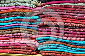 Pile of traditional colorful Arabic scarves