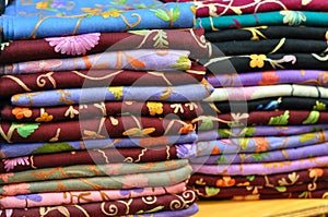 Pile of traditional colorful Arabic scarves