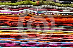 Pile of traditional colorful Arabic scarves