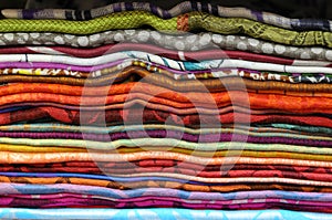 Pile of traditional colorful Arabic scarves