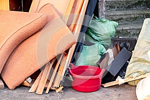 A pile of trash, garbage and old furniture submitted for disposal in the trash