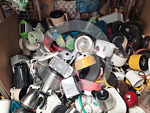 Pile of used Electronic and Housewares Waste Division broken or damage for Reuse and Recycle