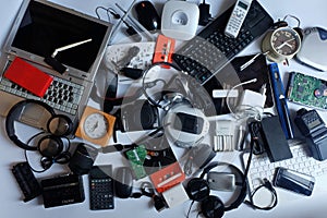 Pile of used Electronic Waste on white background