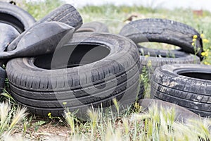 Pile of used rubber tyres