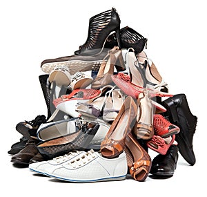 Pile of various female and male shoes