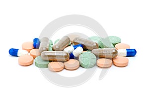 Pile of various pills and tablets photo