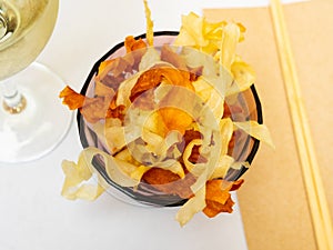 Pile of vegetable chips of sweet potato and yuca in bowl