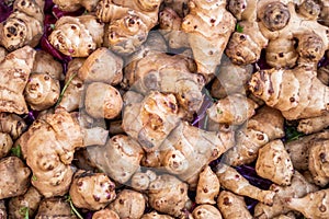 A pile of very delicious exotic vegetables, sunroot in a grocery.