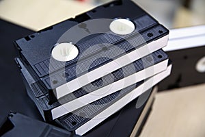 Pile of video cassette tape VHS old retro style stack concept of vintage electric