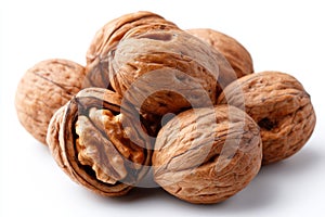A pile of walnuts on a white background