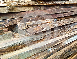 Pile of weathered wood planks