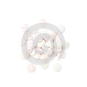 Pile of white breath mint candies isolated