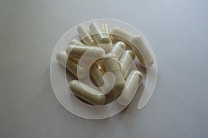 Pile of capsules of Acetyl L-Carnitine photo