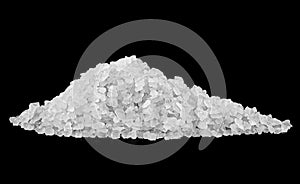 Pile of white coarse sea salt on black background. Sea salt crystals