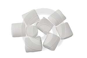 A pile of white marshmallows on a white background