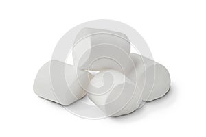 A pile of white marshmallows on a white background