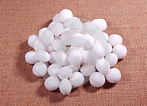 A pile of white naphthalene balls.