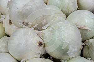 Pile of white onions at the market