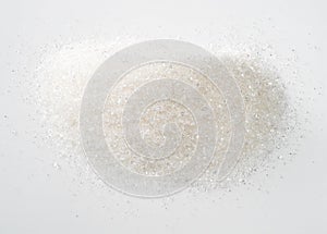 Pile of white sugar from sugar beet on white